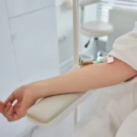 swab-is-pressed-onto-injection-site-blood-collection